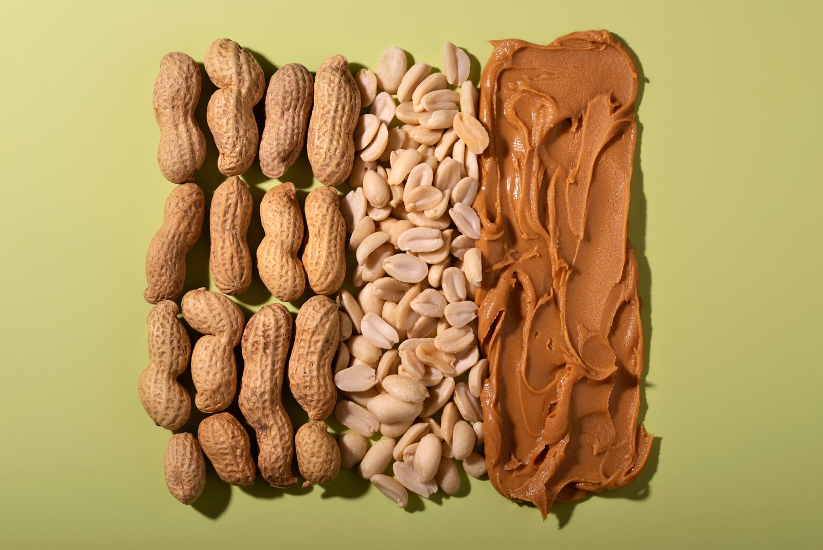 top-view-peanuts-green-background